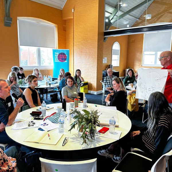 People presenting their ideas at an event