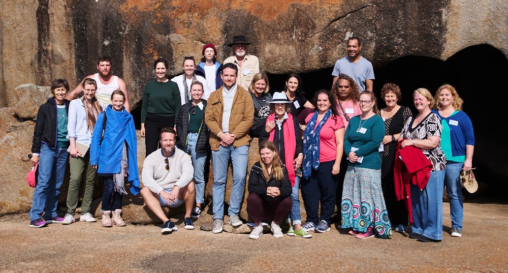 The Our Town community representatives and support team at the Remarkable Rocks on the final day of the retreat.
