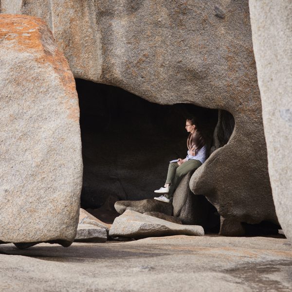 Clear Horizon Support Team member Alessandra Prunotto, in quiet contemplation at the Remarkable Rocks as we reflected on the years ahead and the potential broader impact of the Our Town Network.