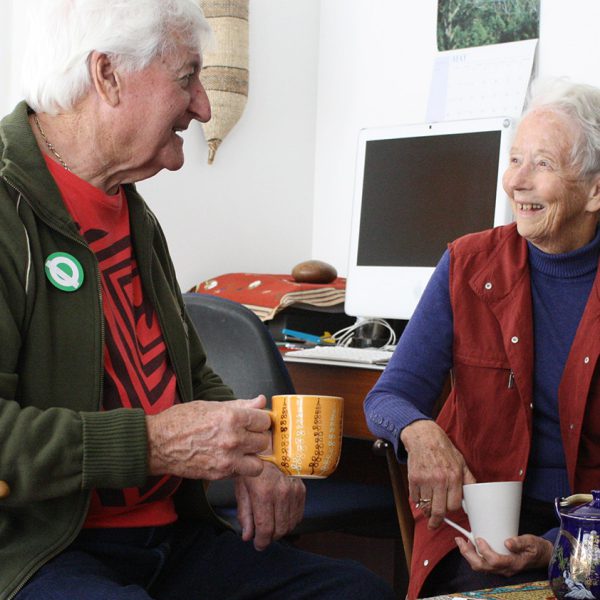 People chatting over tea