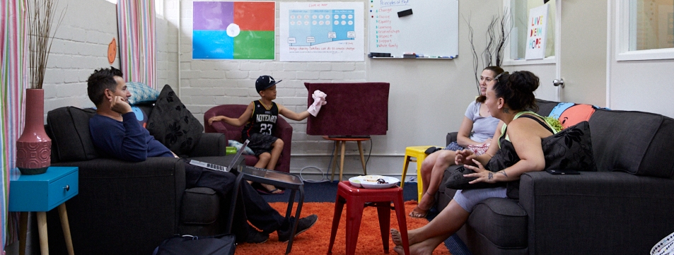 Family by family participants talking in a lounge