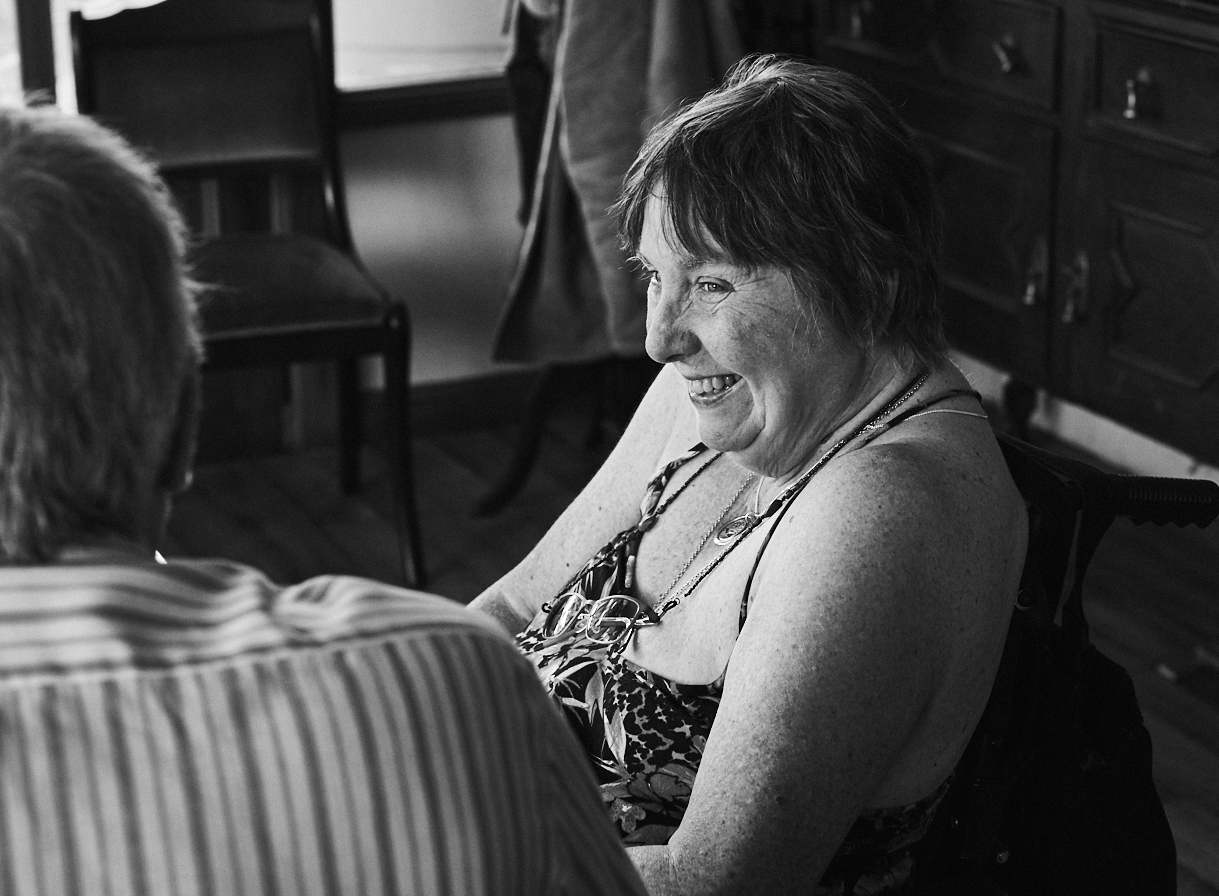 Woman in a wheelchair smiling