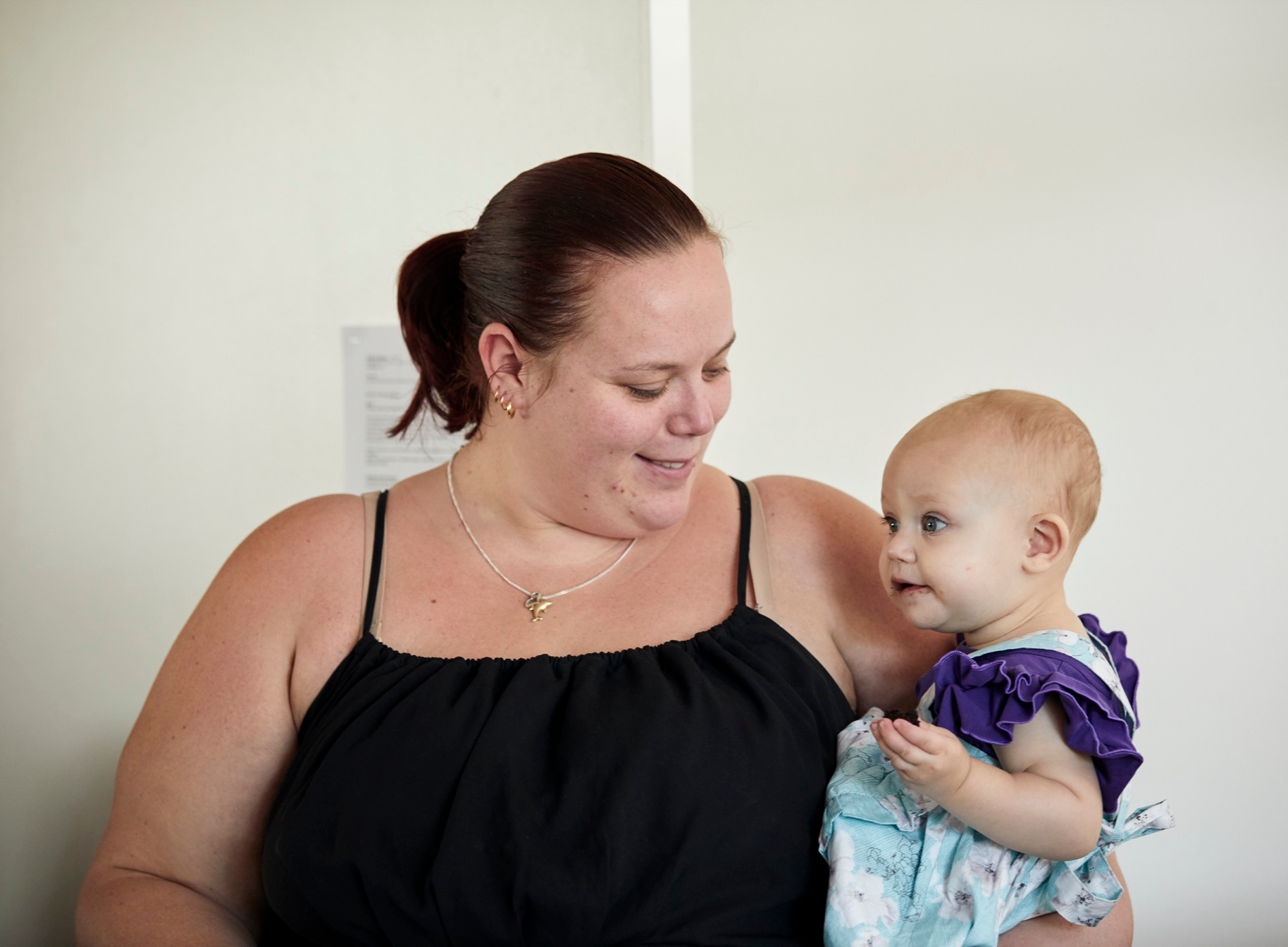Mother holding her child