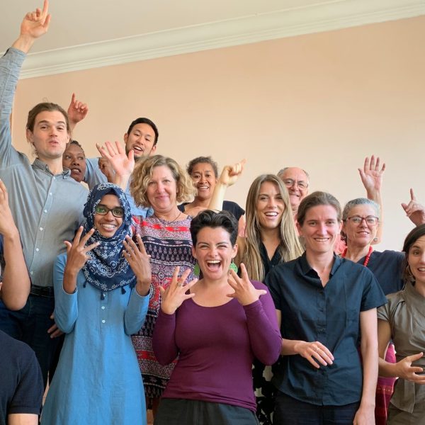 A group of volunteers cheering