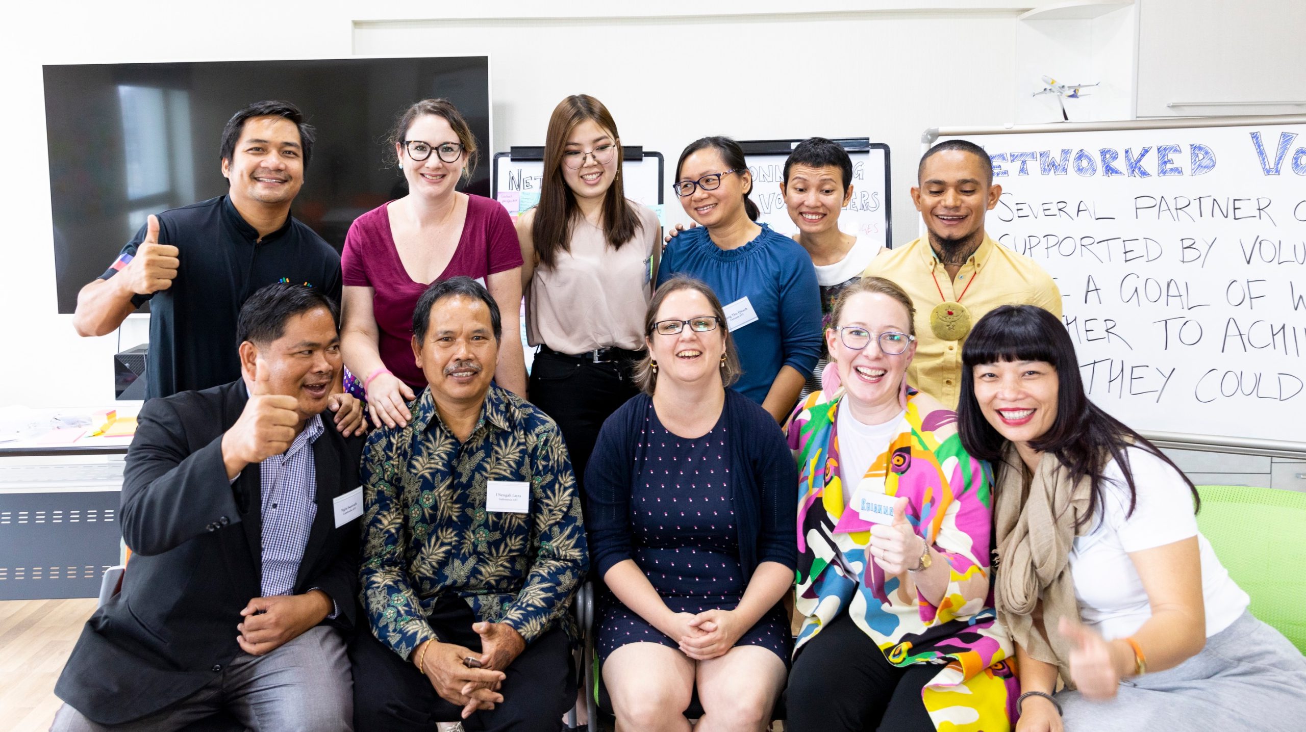 Anna Trahair, AVP’s innovation manager (centre, front row) at an idea generation workshop in Mongolia, related to networked volunteering, with partner organisations from across Asia working in inclusive development.